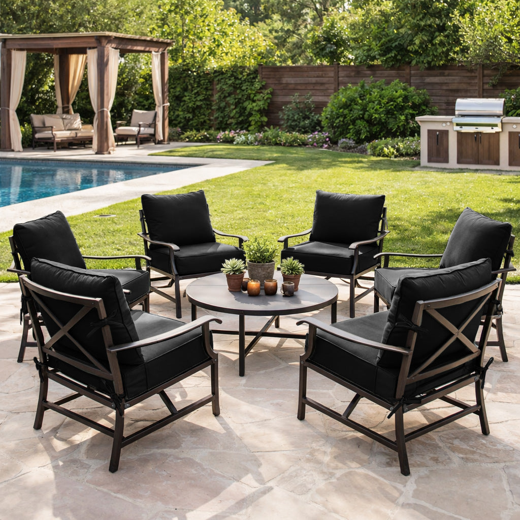 Black outdoor chair cushions on a patio conversation set in a backyard, perfect for comfortable outdoor living, relaxing, and entertaining guests.