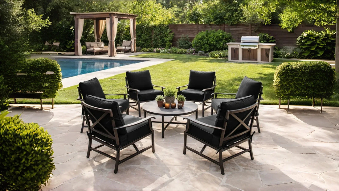 Black outdoor chair cushions on a patio conversation set in a backyard, perfect for comfortable outdoor living, relaxing, and entertaining guests.
