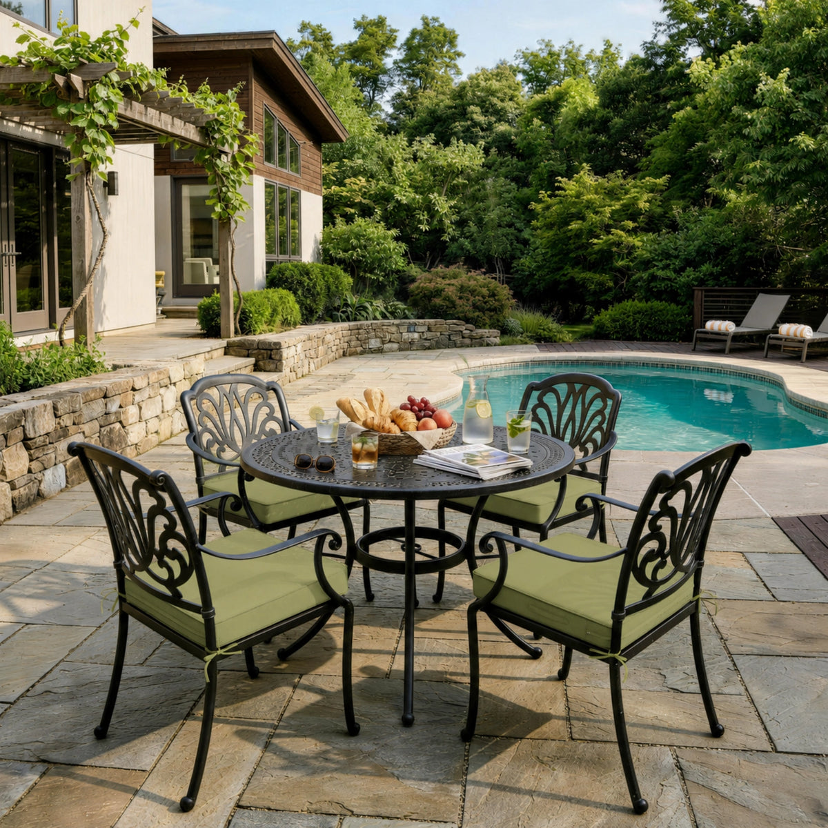 Light Green outdoor seat cushions on patio chairs with a round outdoor dining table in a backyard setting.