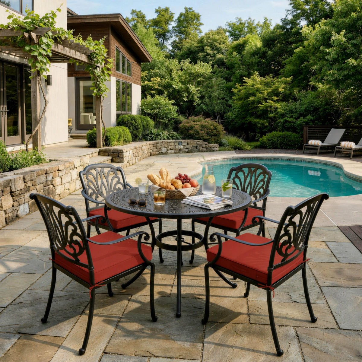 Terra Red outdoor seat cushions on patio chairs with a round outdoor dining table in a backyard setting.