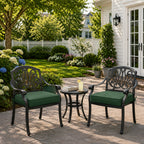 deep seat outdoor cushion in dark green on black metal patio chairs, shown in a sunny outdoor garden setting