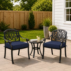 outdoor seat cushion style in navy blue on black metal patio chairs, shown in a backyard outdoor seating setup
