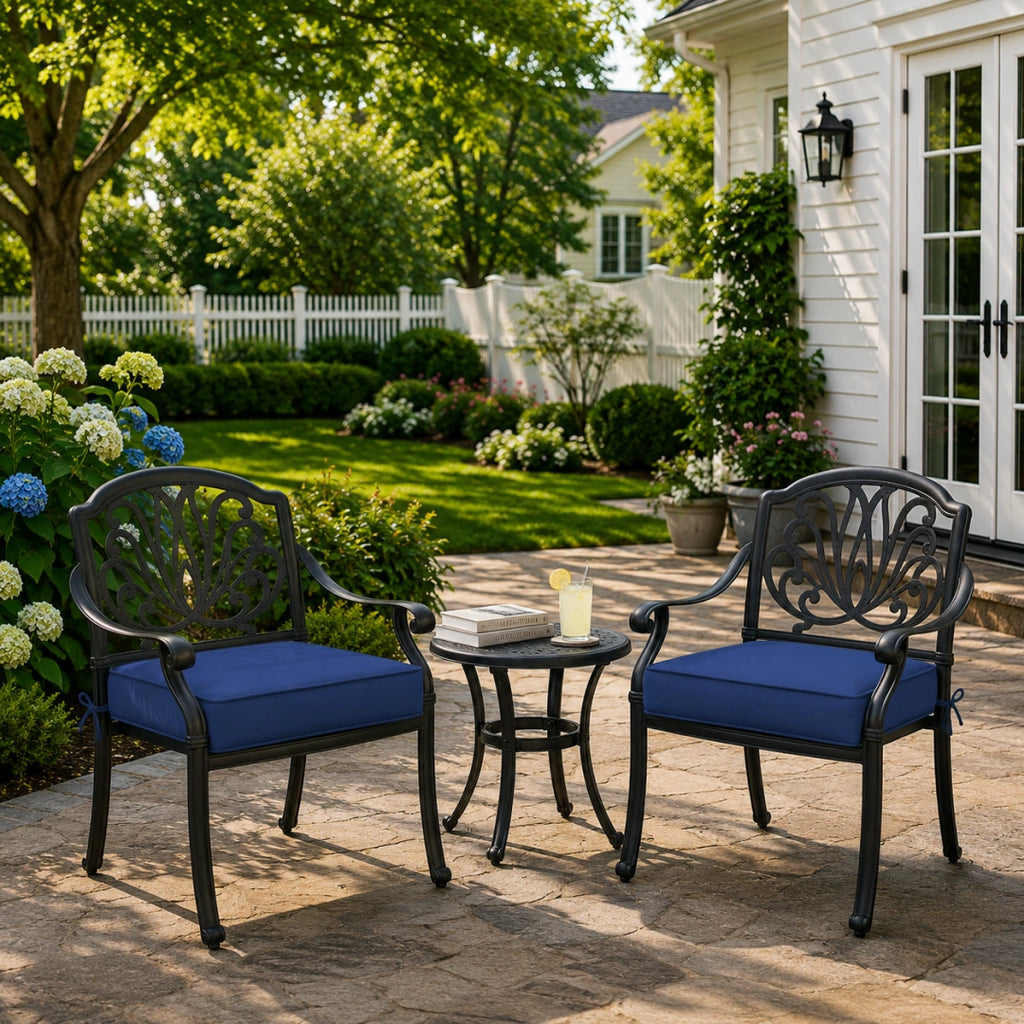 outdoor seat cushion replacement in navy blue on black metal patio chairs, displayed in a bright patio setting