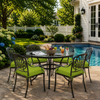 outdoor seat cushions in lime green on black metal patio chairs, styled in a sunny backyard garden with a small round outdoor table